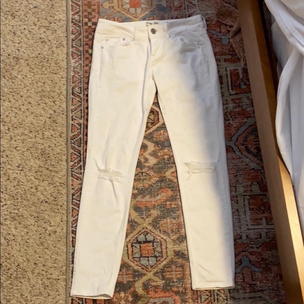 Women’s white hole in knee jeans